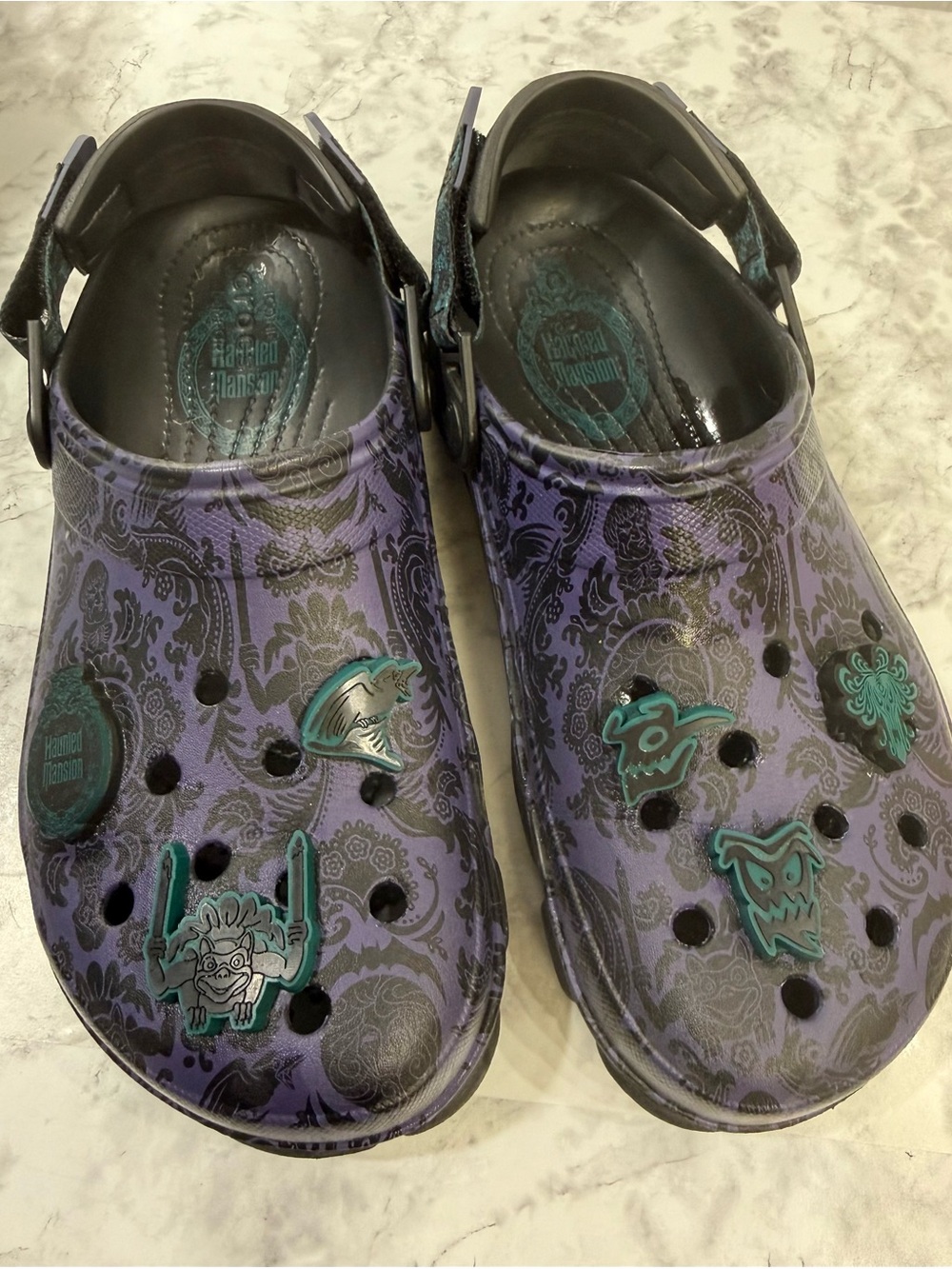 Disney Haunted Mansion Purple Patterned Slip-On crocs w/Teal Charms W- 10 M- 8